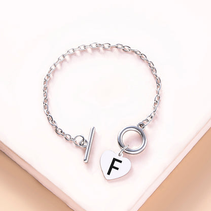 Silver OT Buckle Initial Heart Bracelet